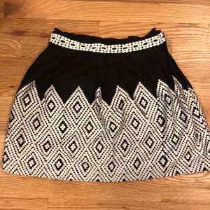 Black skirt with white embroidery